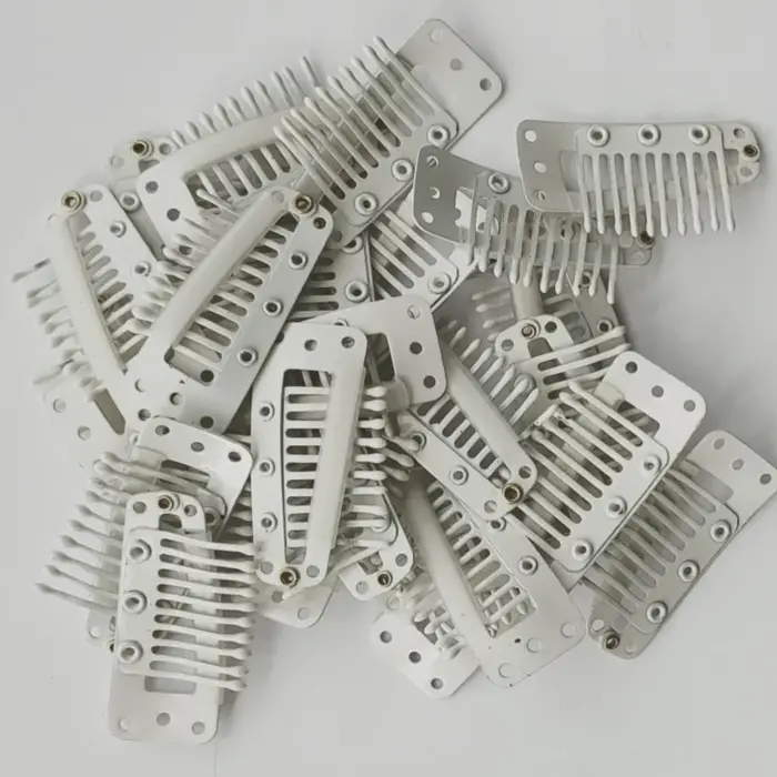 Clips à clipser pour extensions de cheveux humains