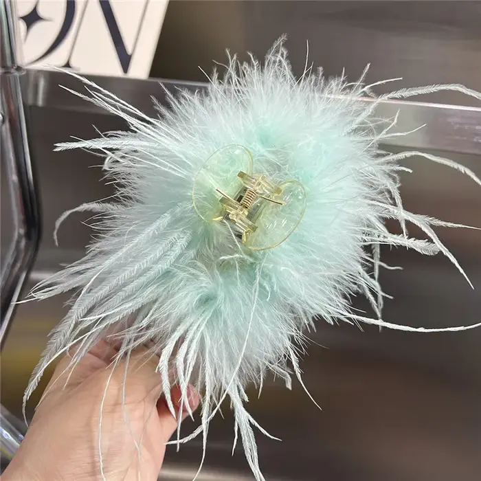 Pince à cheveux en plumes d'autruche véritable