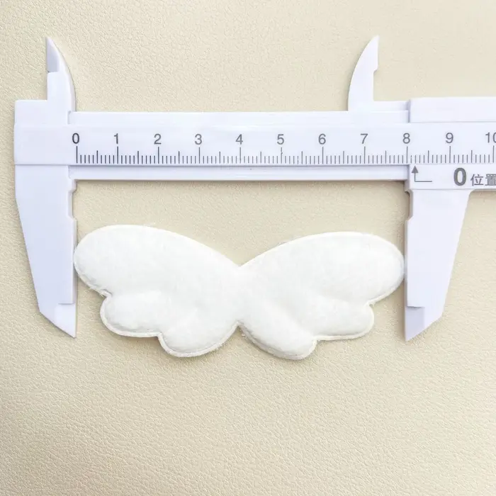 Barrettes à cheveux en forme d'ailes d'ange en peluche pour femmes