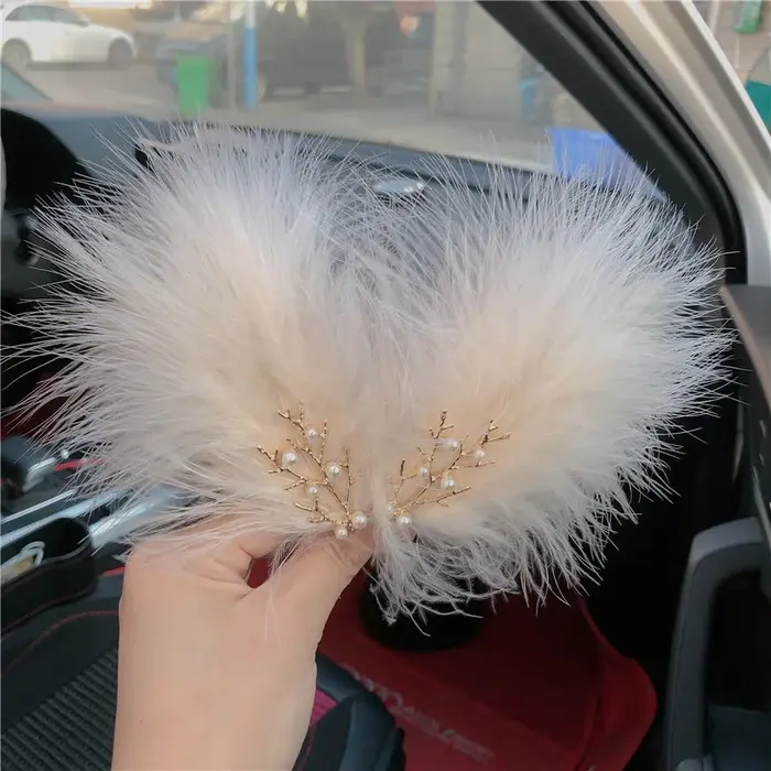 Pince à cheveux pour coiffure en plumes