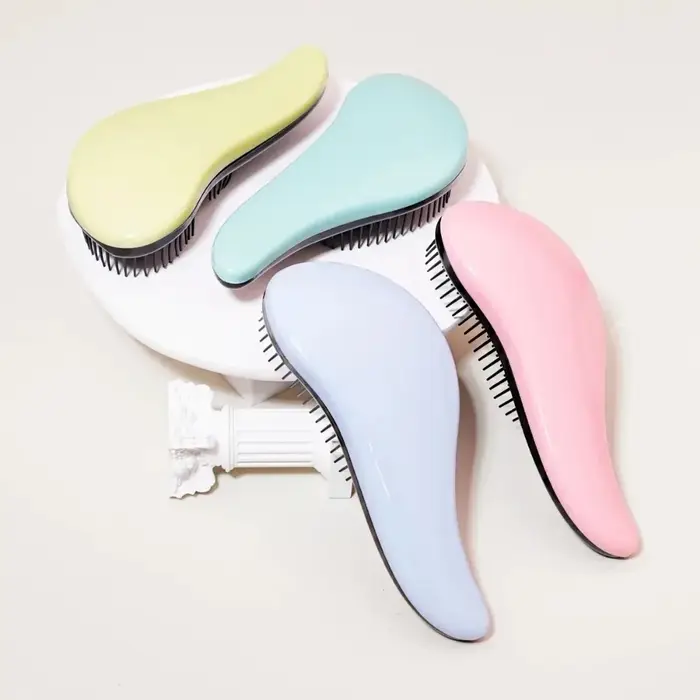 Brosse démêlante antistatique massante
