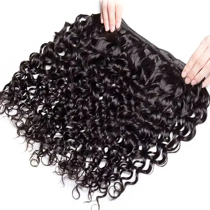 Tissage en lot brésilien naturel bouclé profond