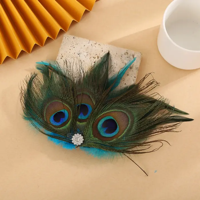 Pince à cheveux élégante en plumes de paon