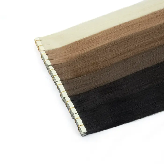 Extensions de cheveux synthétiques à bandes adhésives