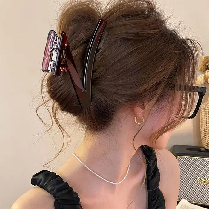 Pince à cheveux avec nœud en plastique