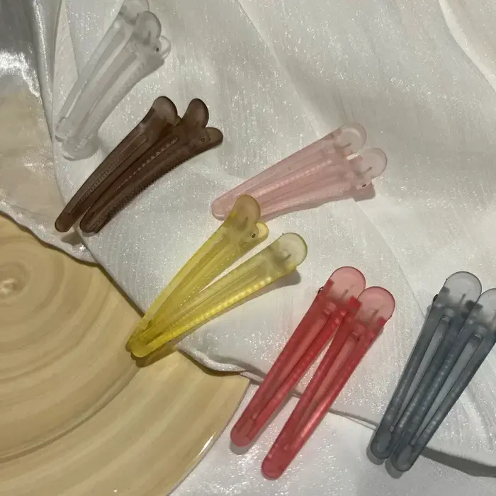 Pinces à cheveux colorées givrées en bec de canard