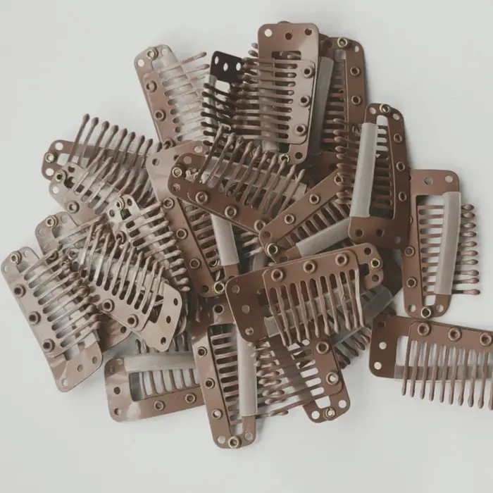 Clips à clipser pour extensions de cheveux humains