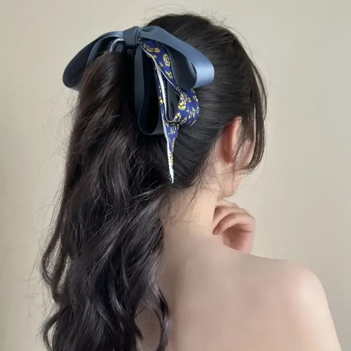 Pince à cheveux élégante en forme de nœud papillon