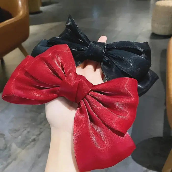 Pince à cheveux à nœud papillon brillant