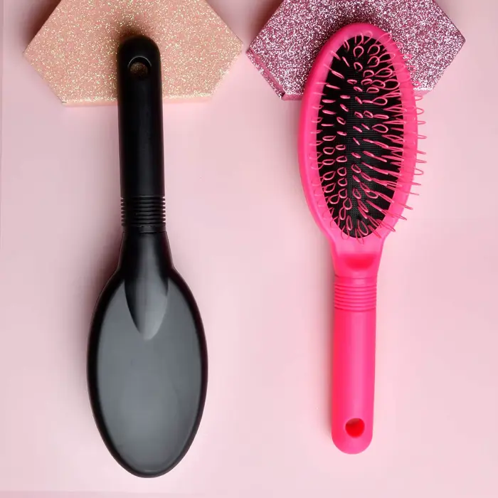 Brosse à perruque en boucle