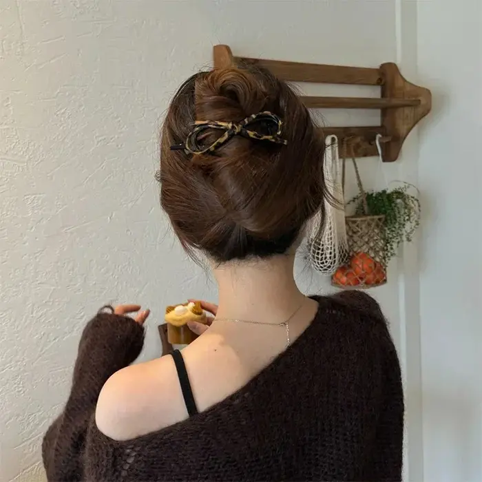 Pinces à cheveux torsadées imprimé léopard pour femmes