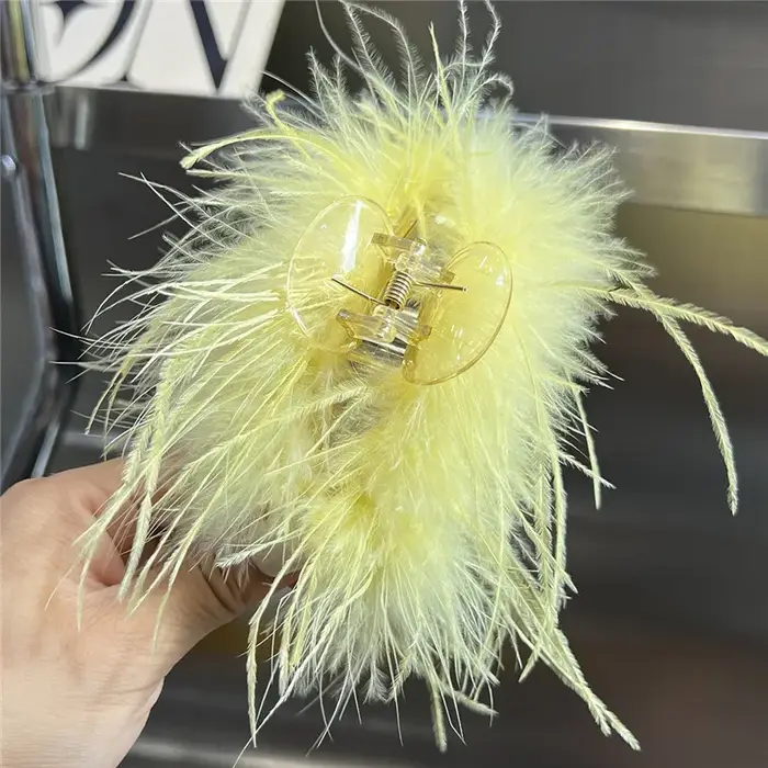 Pince à cheveux en plumes d'autruche véritable