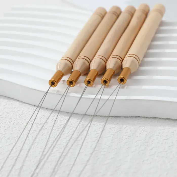 Outil de pose pour extensions capillaires : micro-anneaux