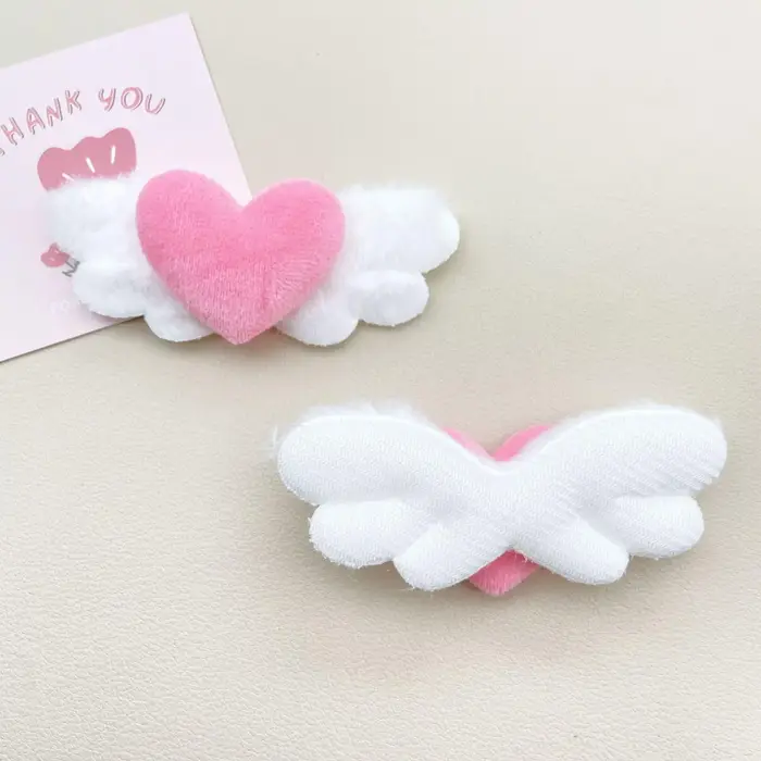 Barrettes à cheveux en forme d'ailes d'ange en peluche pour femmes