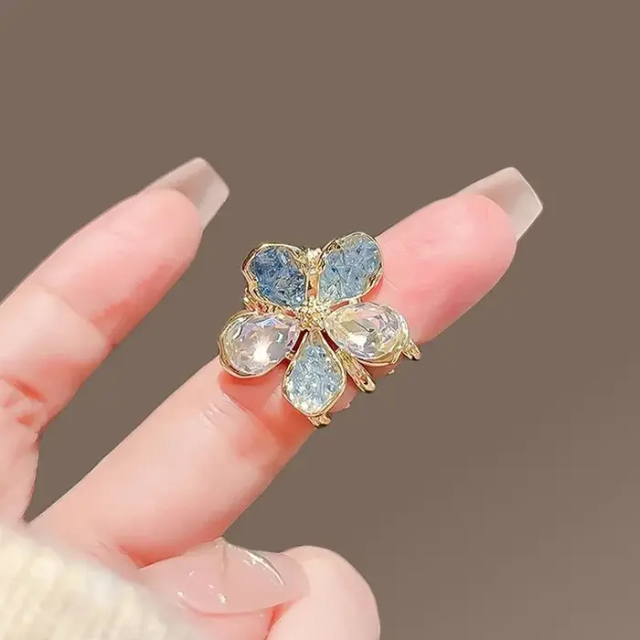 Petite griffe de cheveux en cristal bleu