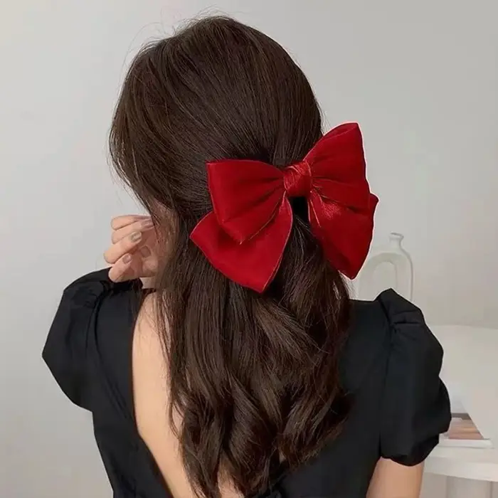 Pince à cheveux à nœud papillon brillant