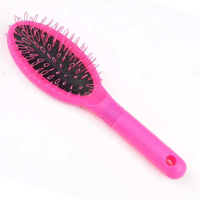 Brosse à perruque en boucle