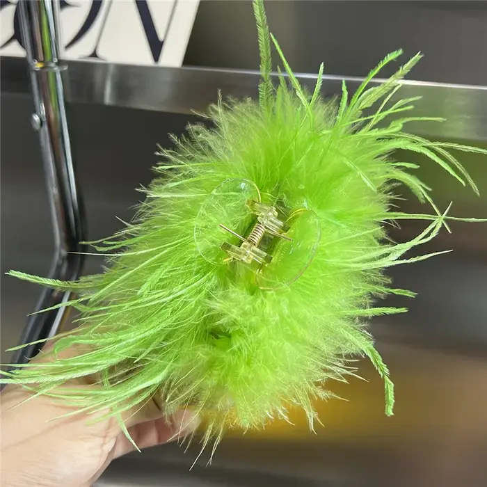Pince à cheveux en plumes d'autruche véritable