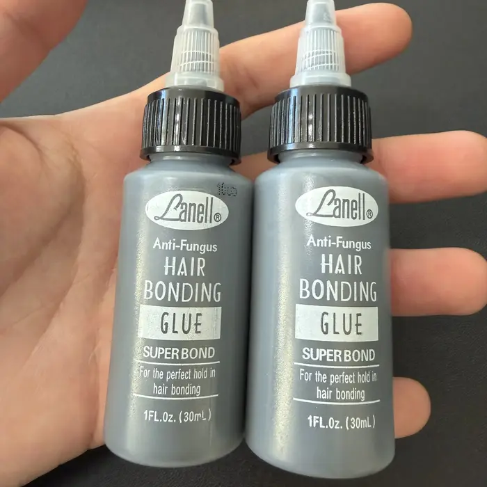 Colle de liaison pour trame de cheveux noirs