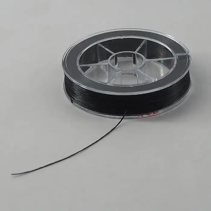 Fil entièrement élastique pour la fabrication d'extensions de cheveux invisibles à plumes 60 m/roule