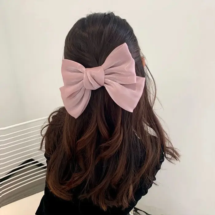 Pince à cheveux à nœud papillon brillant