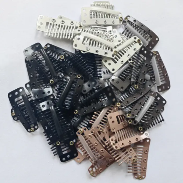 Clips à clipser pour extensions de cheveux humains
