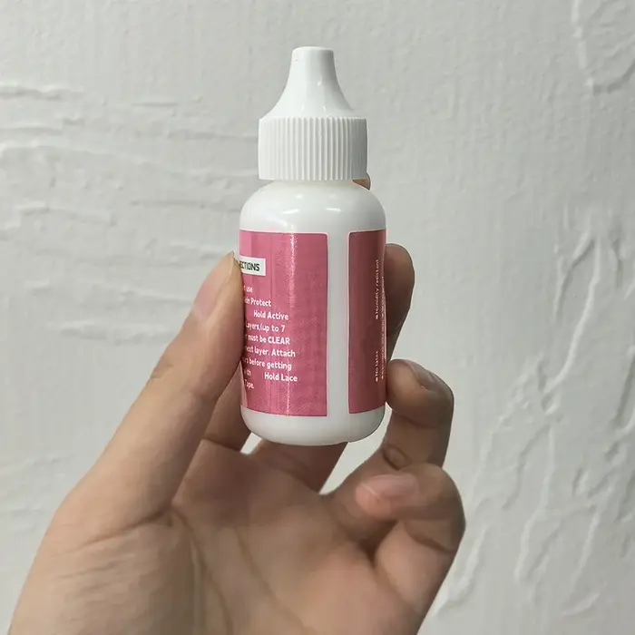 Colle pour perruque en dentelle - 1,3 oz, colle liquide imperméable pour perruques, colle invisible pour perruques, colle adhésive pour perruques à tenue forte et longue durée, colle blanche
