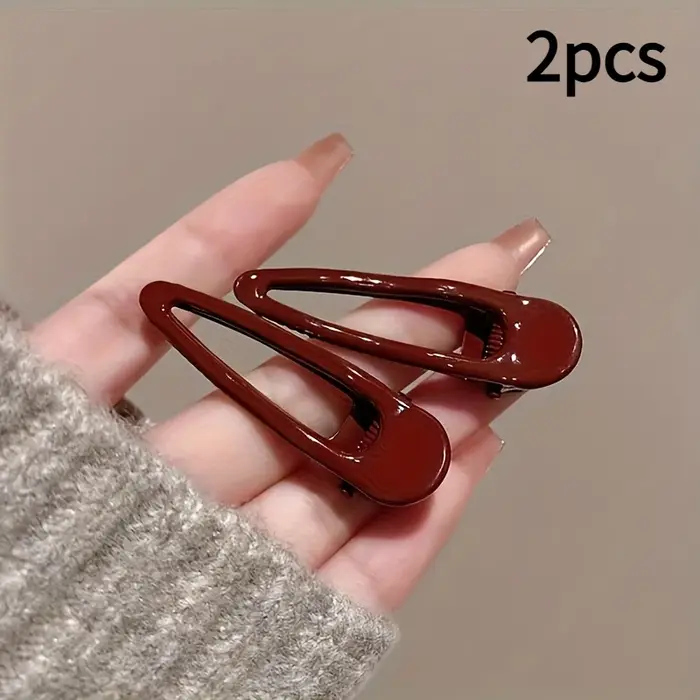 2 pinces à cheveux bordeaux