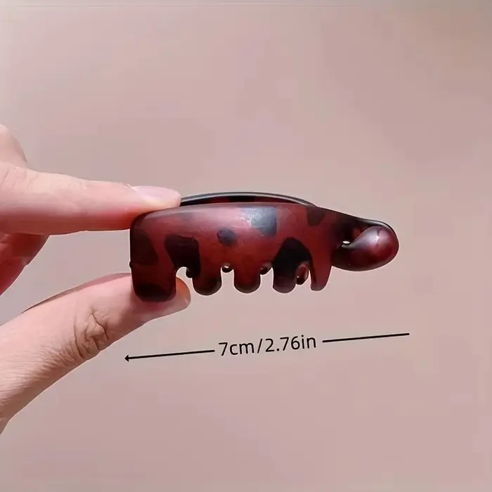 Pince à cheveux ergonomique en forme de banane