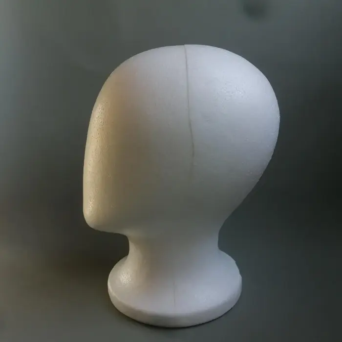Tête de mannequin en mousse sans visage pour coiffure