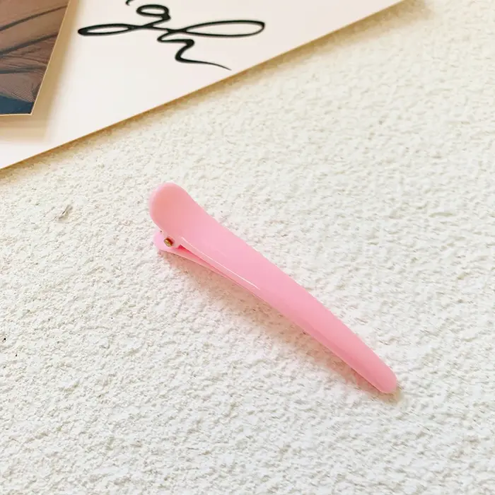 Pince à cheveux professionnelle pour coiffeur