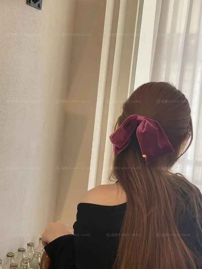 Pince à cheveux élégante en velours avec nœud papillon