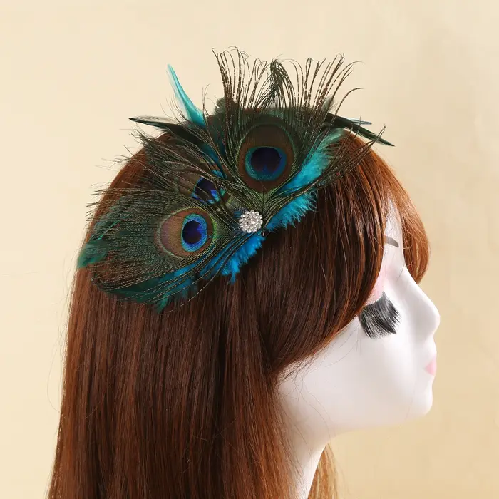 Pince à cheveux élégante en plumes de paon