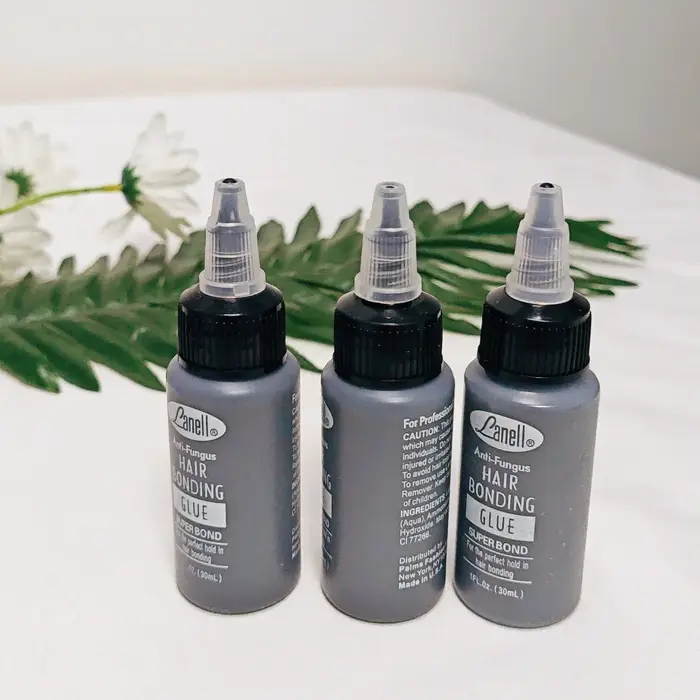 Colle de liaison pour trame de cheveux noirs