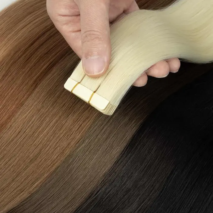 Extensions de cheveux synthétiques à bandes adhésives
