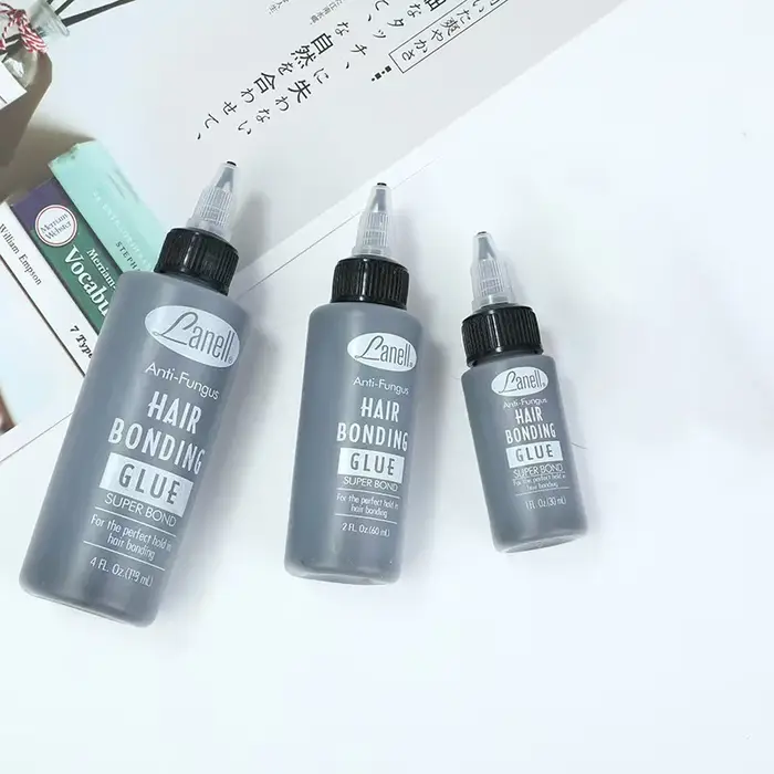 Colle de liaison pour trame de cheveux noirs