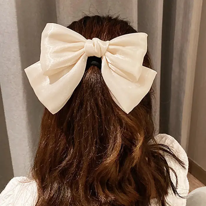 Pince à cheveux à nœud papillon brillant