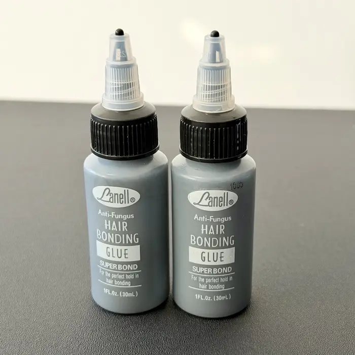 Colle de liaison pour trame de cheveux noirs