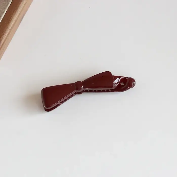 Pince banane à nœud en plastique couleur Morandi